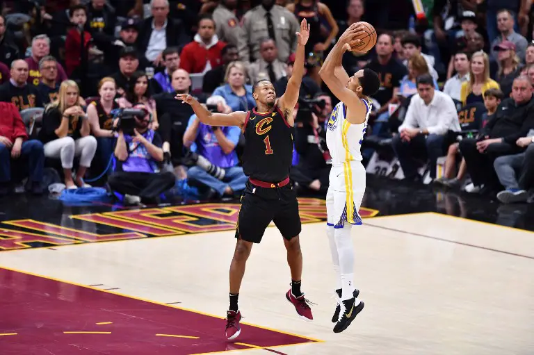 CLEVELAND, OH - JUNE 06: Shaun Livingston #34 of the Golden State Warriors shoots against Rodney Hood #1 of the Cleveland Cavaliers during Game Three of the 2018 NBA Finals at Quicken Loans Arena on June 6, 2018 in Cleveland, Ohio. NOTE TO USER: User expressly acknowledges and agrees that, by downloading and or using this photograph, User is consenting to the terms and conditions of the Getty Images License Agreement.   Jamie Sabau/Getty Images/AFP