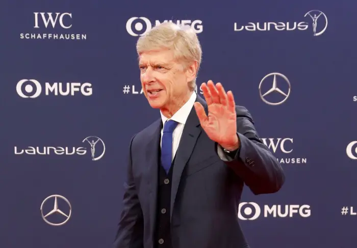 Arsene Wenger gestures as he arrives at the ceremony