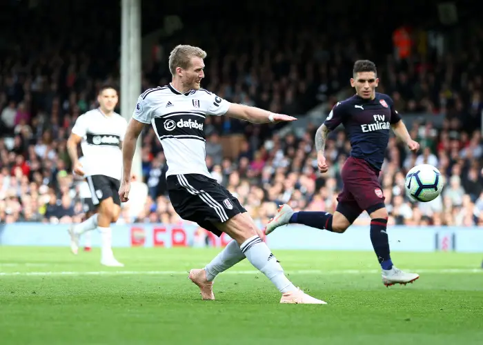 7th October 2018, Craven Cottage, London, England; EPL Premier League football, Fulham versus Arsenal; Andre Schurrle of Fulham shoots to score his sides 1st goal in the 44th minute to make it 1-1