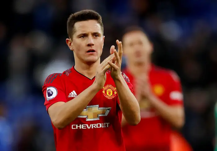 Manchester United's Ander Herrera celebrates after the match with team mates