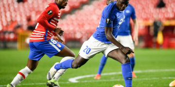 Granada CF player Yan Eteki and Molde FK player David Datro Fofana are seen in action during the UEFA Europa League Round of 16 First Leg one match between Granada CF and Molde FK at Estadio Nuevo Los Carmenes.
(Final Score; Granada CF 2:0 Molde FK) (Photo by Carlos Gil / SOPA Images/Sipa USA) 
By Icon Sport