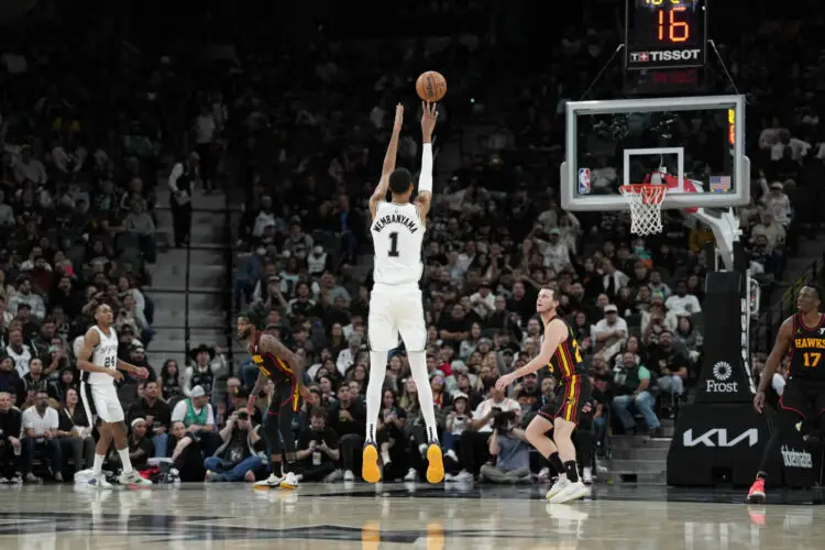 Nov 30, 2023; San Antonio, Texas, USA; San Antonio Spurs center Victor Wembanyama (1) shoots over Atlanta Hawks guard Garrison Mathews (25) in the second half at the Frost Bank Center. Mandatory Credit: Daniel Dunn-USA TODAY Sports/Sipa USA - Photo by Icon sport