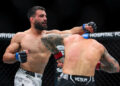 Mar 9, 2024; Miami, Florida, USA; Benoit Saint Denis (blue gloves) fights Dustin Poirier (red gloves) during UFC 299 at Kayesa Center. Mandatory Credit: Sam Navarro-USA TODAY Sports/Sipa USA   - Photo by Icon Sport