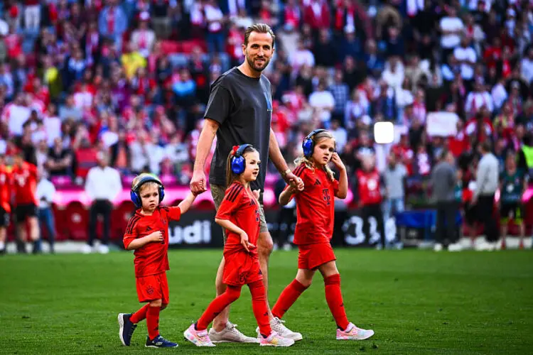 12 May 2024, Bavaria, Munich: Soccer: Bundesliga, Bayern Munich - VfL Wolfsburg, Matchday 33 at the Allianz Arena, Munich's Harry Kane walks with children in the playground after the match. IMPORTANT NOTE: In accordance with the regulations of the DFL German Football League and the DFB German Football Association, it is prohibited to exploit or have exploited photographs taken in the stadium and/or of the match in the form of sequential images and/or video-like photo series. Photo: Tom Weller/dpa   Photo by Icon Sport   - Photo by Icon Sport