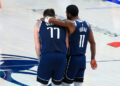 May 26, 2024; Dallas, Texas, USA; Dallas Mavericks guard Luka Doncic (77) and Dallas Mavericks guard Kyrie Irving (11) hug during the fourth quarter against the Minnesota Timberwolves during game three of the western conference finals for the 2024 NBA playoffs at American Airlines Center. Mandatory Credit: Kevin Jairaj-USA TODAY Sports/Sipa USA   - Photo by Icon Sport