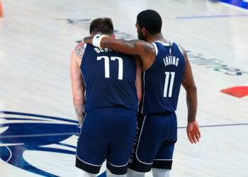 May 26, 2024; Dallas, Texas, USA; Dallas Mavericks guard Luka Doncic (77) and Dallas Mavericks guard Kyrie Irving (11) hug during the fourth quarter against the Minnesota Timberwolves during game three of the western conference finals for the 2024 NBA playoffs at American Airlines Center. Mandatory Credit: Kevin Jairaj-USA TODAY Sports/Sipa USA   - Photo by Icon Sport