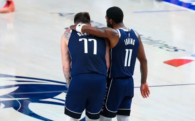 May 26, 2024; Dallas, Texas, USA; Dallas Mavericks guard Luka Doncic (77) and Dallas Mavericks guard Kyrie Irving (11) hug during the fourth quarter against the Minnesota Timberwolves during game three of the western conference finals for the 2024 NBA playoffs at American Airlines Center. Mandatory Credit: Kevin Jairaj-USA TODAY Sports/Sipa USA   - Photo by Icon Sport