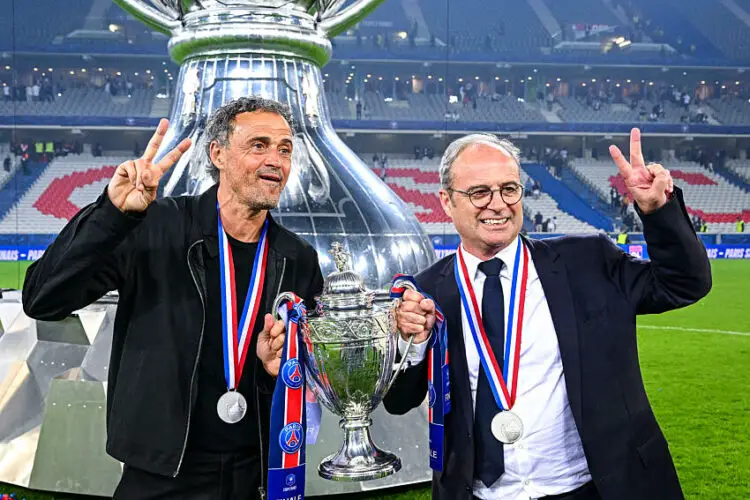 Luis ENRIQUE head coach of Paris Saint Germain (PSG) and Luis CAMPOS Sporting Director of Paris Saint Germain (PSG) celebrate with the trophy after the French Cup Final match between Lyon and Paris at Stade Pierre-Mauroy on May 25, 2024 in Lille, France.(Photo by Baptiste Fernandez/Icon Sport)   - Photo by Icon Sport