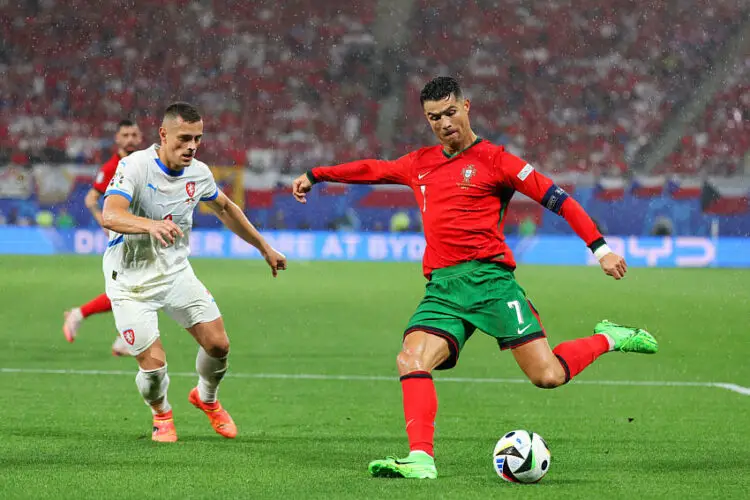 Cristiano Ronaldo (R) of Portugal is seen in action against Tomáš Holeš (L) of Czech Republic during the UEFA Euro 2024 match between Portugal VS Czech Republic at the Red Bull Arena on June 18, 2024 (Final score Portugal 2-1 Czech Republic) (Photo by Sergei Mikhailichenko / SOPA Images/Sipa USA)   - Photo by Icon Sport