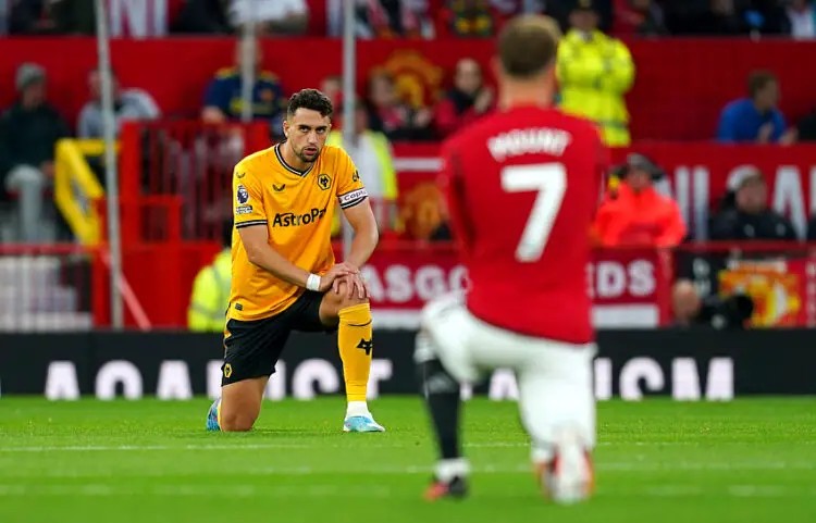 Wolverhampton Wanderers' Maximilian Kilman (left) and Manchester United's Mason Mount take the knee before the Premier League match at Old Trafford, Manchester. Picture date: Monday August 14, 2023. - Photo by Icon sport  - Photo by Icon Sport