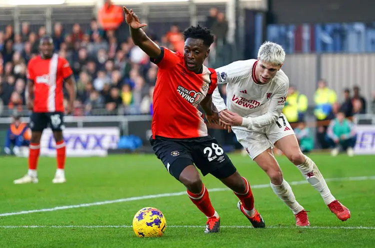 Luton Town's Albert Sambi Lokonga (left) and Manchester United's Alejandro Garnacho battle for the ball during the Premier League match at Kenilworth Road, Luton. Picture date: Sunday February 18, 2024. - Photo by Icon Sport   - Photo by Icon Sport