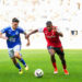 Sergio AKIEME of Reims and Jessy DEMINGUET of Strasbourg during the Ligue 1 Uber Eats match between Strasbourg and Reims at Stade de la Meinau on April 13, 2024 in Strasbourg, France.(Photo by Hugo Pfeiffer/Icon Sport)   - Photo by Icon Sport