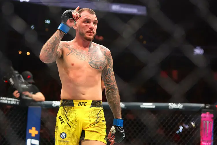 Apr 13, 2024; Las Vegas, Nevada, USA; Renato Moicano (blue gloves) reacts after defeating Jalin Turner (not pictured) during UFC 300 at T-Mobile Arena. Mandatory Credit: Mark J. Rebilas-USA TODAY Sports/Sipa USA   - Photo by Icon Sport
