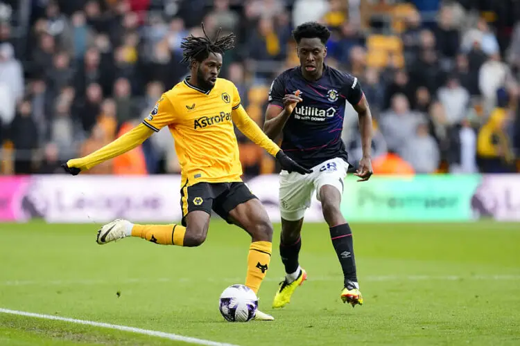 Wolverhampton Wanderers' Boubacar Traore (left) and Luton Town's Albert Sambi Lokonga battle for the ball during the Premier League match at Molineux Stadium, Wolverhampton. Picture date: Saturday April 27, 2024.   - Photo by Icon Sport