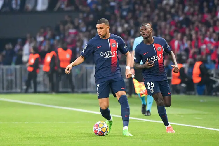 Nuno MENDES, Kylian MBAPPE - Photo by Icon Sport