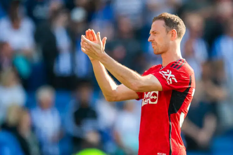 Jonny Evans of Manchester United applauds the travelling support after victory over Brighton at the Premier League match at the American Express Stadium, Brighton and Hove Picture by Graeme Wilcockson/Focus Images Ltd 07940465341 19/05/2024   - Photo by Icon Sport