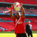 25th May 2024;  Wembley Stadium, London, England; FA Cup Final Football, Manchester City versus Manchester United; Willy Kambwala of Manchester United celebrates with the FA Cup trophy in front of the Man Utd fans   - Photo by Icon Sport