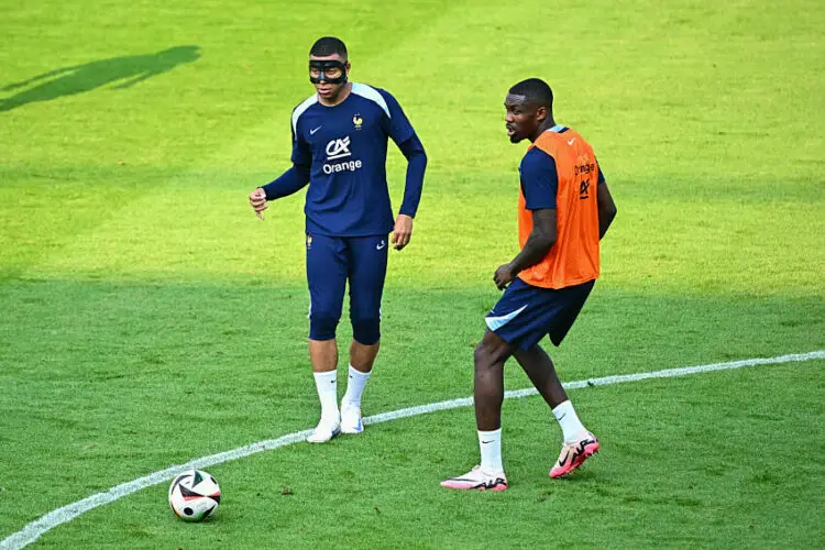Kylian MBAPPE of France and Marcus THURAM - Photo by Icon Sport