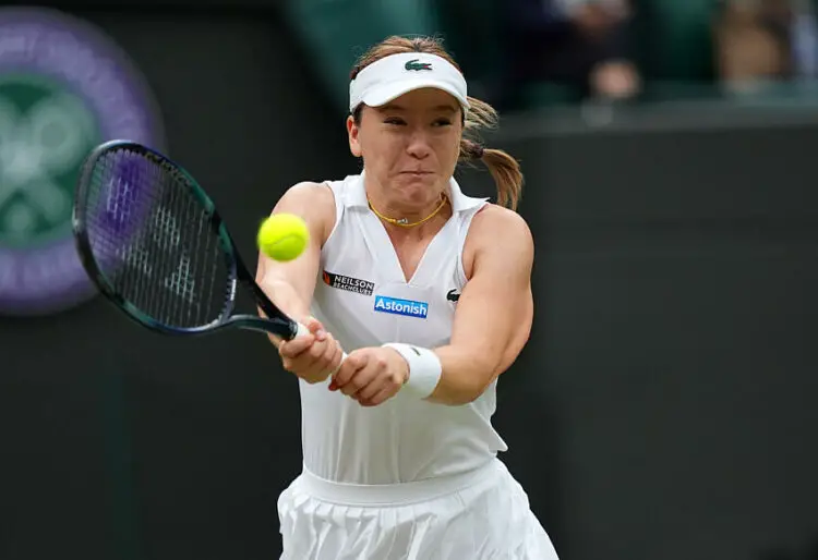 Lulu Sun in action against Donna Vekic (not pictured) on day nine of the 2024 Wimbledon Championships at the All England Lawn Tennis and Croquet Club, London. Picture date: Tuesday July 9, 2024.   - Photo by Icon Sport