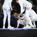 France's Auriane Mallo-Breton reacts after losing against Italy's team in the women's epee team gold medal bout between France and Italy during the Paris 2024 Olympic Games at the Grand Palais in Paris, on July 30, 2024. The rest of Team France came to her rescue to consol her while she recovers from her loss. Photo by Eliot Blondet/ABACAPRESS.COM   - Photo by Icon Sport