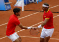 Spanish tennis players Rafa Nadal (R) and Carlos Alcaraz (L) reacts during Men's doubles second round against Wesley Koolhof y Tallon Griekspoor, of Netherlands, within Paris 2024 Olympic Games in Paris, France, 30 July 2024. Efe/ABACAPRESS.COM// Juanjo Martin   - Photo by Icon Sport