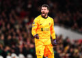 Liverpool goalkeeper Alisson Becker celebrates their side's first goal of the game, scored by Arsenal's Gabriel (not pictured) via an own goal during the Premier League match at Emirates Stadium, London. Picture date: Sunday February 4, 2024. - Photo by Icon Sport   - Photo by Icon Sport