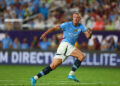 Jul 30, 2024; Orlando, FL, USA; Manchester City forward Erling Haaland (9) makes a run against Barcelona in the first half during a Champions Tour friendly match at Camping World Stadium. Mandatory Credit: Nathan Ray Seebeck-USA TODAY Sports/Sipa USA   - Photo by Icon Sport