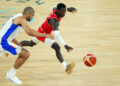 Dennis Schroder au duel avec Nicolas Batum   - Photo by Icon Sport