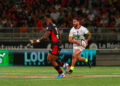 Sofiane GUITOUNE of Toulouse and Semi RADRADRA of Lyon  during the Top 14 match between Lyon and Toulouse at MATMUT Stadium on June 8, 2024 in Lyon, France.(Photo by Romain Biard/Icon Sport)   - Photo by Icon Sport