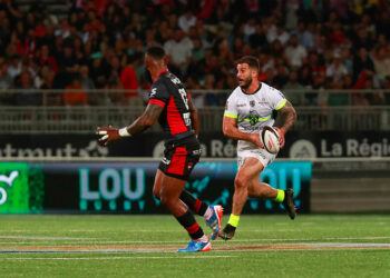 Sofiane GUITOUNE of Toulouse and Semi RADRADRA of Lyon  during the Top 14 match between Lyon and Toulouse at MATMUT Stadium on June 8, 2024 in Lyon, France.(Photo by Romain Biard/Icon Sport)   - Photo by Icon Sport