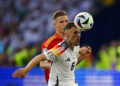 Spain's Dani Olmo (L) in action against Germany's Joshua Kimmich (R) during the UEFA Euro 2024's quarter-finals game between Spain and Germany at MHPArena stadium in Stuttgart, Germany, 05 July 2024. Efe/ABACAPRESS.COM// Alberto Estevez   - Photo by Icon Sport