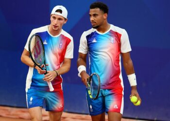 French duo Arthur Fils - Ugo Humbert pictured during a doubles tennis match between French pair Fils-Humbert and Belgian pair Gille-Vliegen, in the first round of the men's doubles competition at the Paris 2024 Olympic Games, on Monday 29 July 2024 in Paris, France. The Games of the XXXIII Olympiad are taking place in Paris from 26 July to 11 August. The Belgian delegation counts 165 athletes competing in 21 sports. BELGA PHOTO BENOIT DOPPAGNE   - Photo by Icon Sport