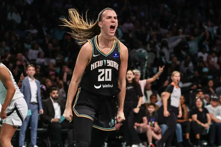 Oct 1, 2024; Brooklyn, New York, USA; New York Liberty guard Sabrina Ionescu (20) celebrates during game two of the 2024 WNBA Semi-finals against the Las Vegas Aces at Barclays Center. Mandatory Credit: Wendell Cruz-Imagn Images   - Photo by Icon Sport