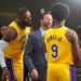 Sep 30, 2024; El Segundo, CA, USA; Los Angeles Lakers forward LeBron James (23) watches as ESPN reporter Dave McMenamin, (center) interviews son Bronny James (9) during media day at the UCLA Health Training Center. Mandatory Credit: Kirby Lee-Imagn Images   - Photo by Icon Sport